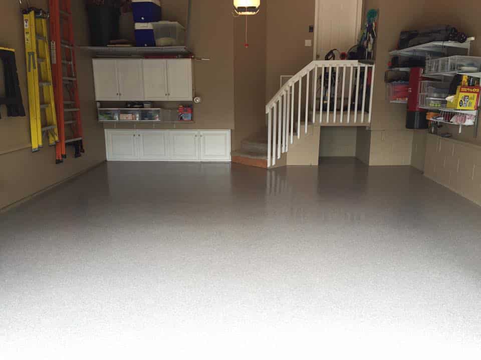 Same garage after a glossy gray flake-chip coating
